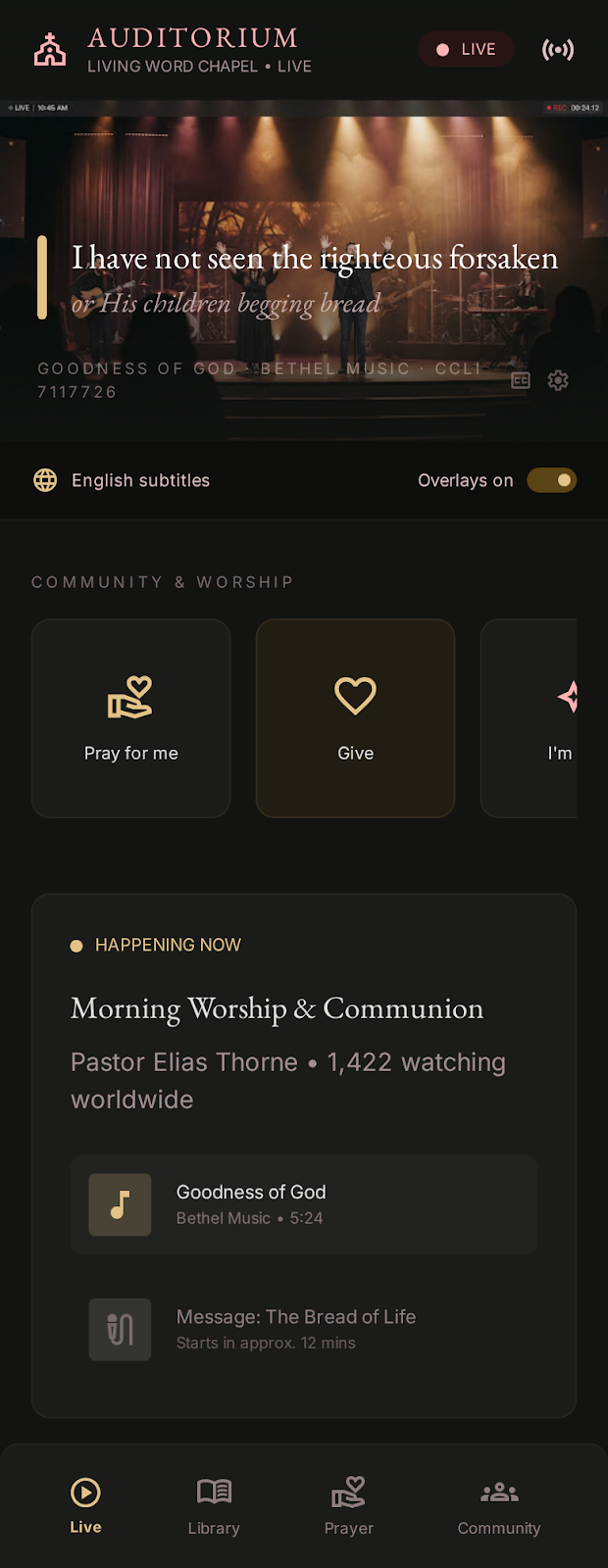 Auditorium worship view — licensed lyrics on screen, happening now: Morning Worship and Communion, 1,422 watching worldwide
